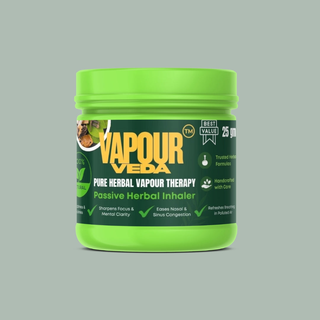 Green jar of Vapour Veda pure herbal vapour therapy on a gray background